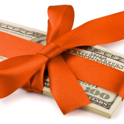 Home Thumbnail WholesomeGives money wrapped up in ORANGE ribbon