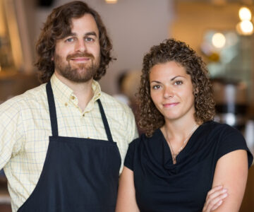 For Restaurant Partners on Home Page – Two person RP team close up Suggested Crop